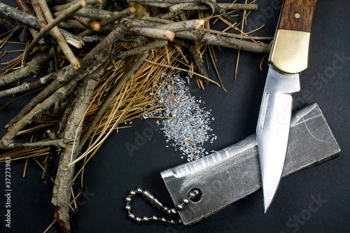 Magnesium Fire Starter - Pocket Knife - Tinder Pile photo