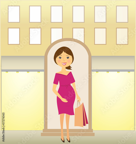 beautiful pregnant woman with many package near urban shop