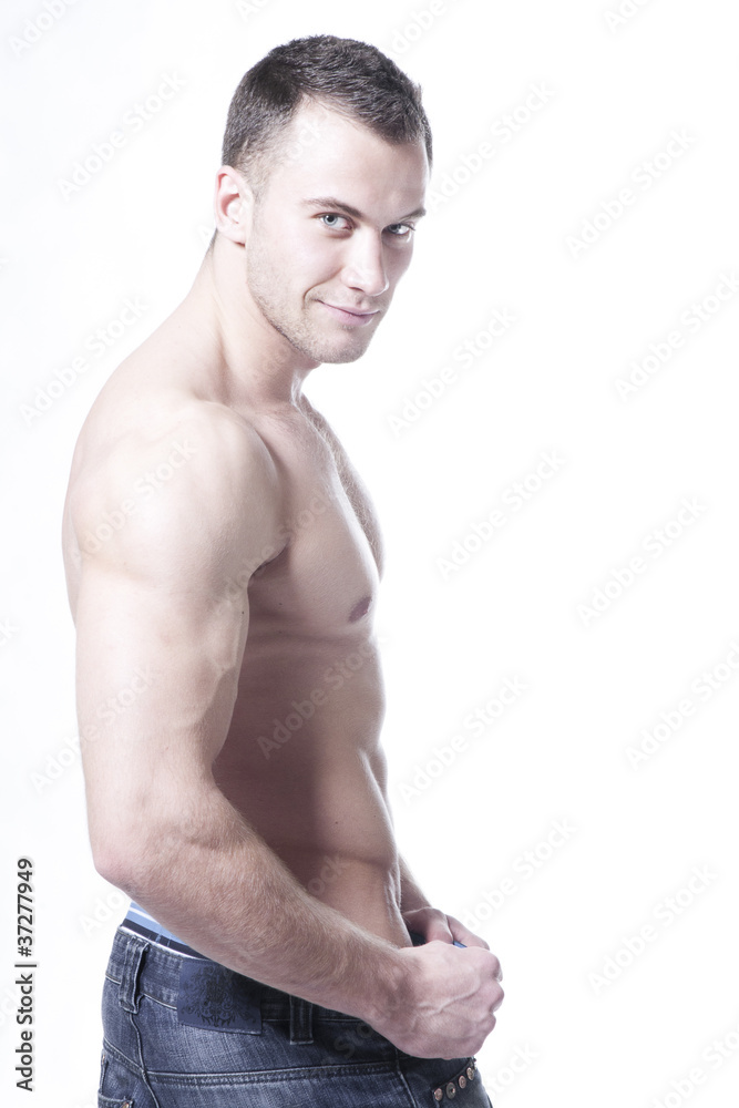 Sexy young sportrsman smiling Sexy young sportrsman smiling