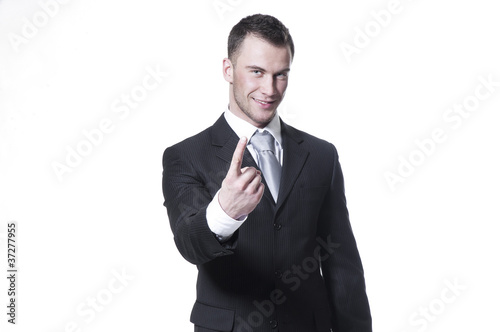 Handsome young businessman in black suit and grey necktie