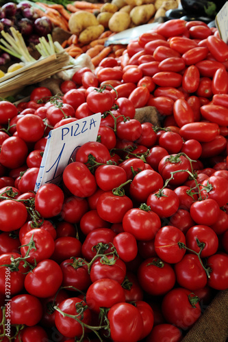 Fototapeta Naklejka Na Ścianę i Meble -  Fresh tomatoes at farmer market in Italy