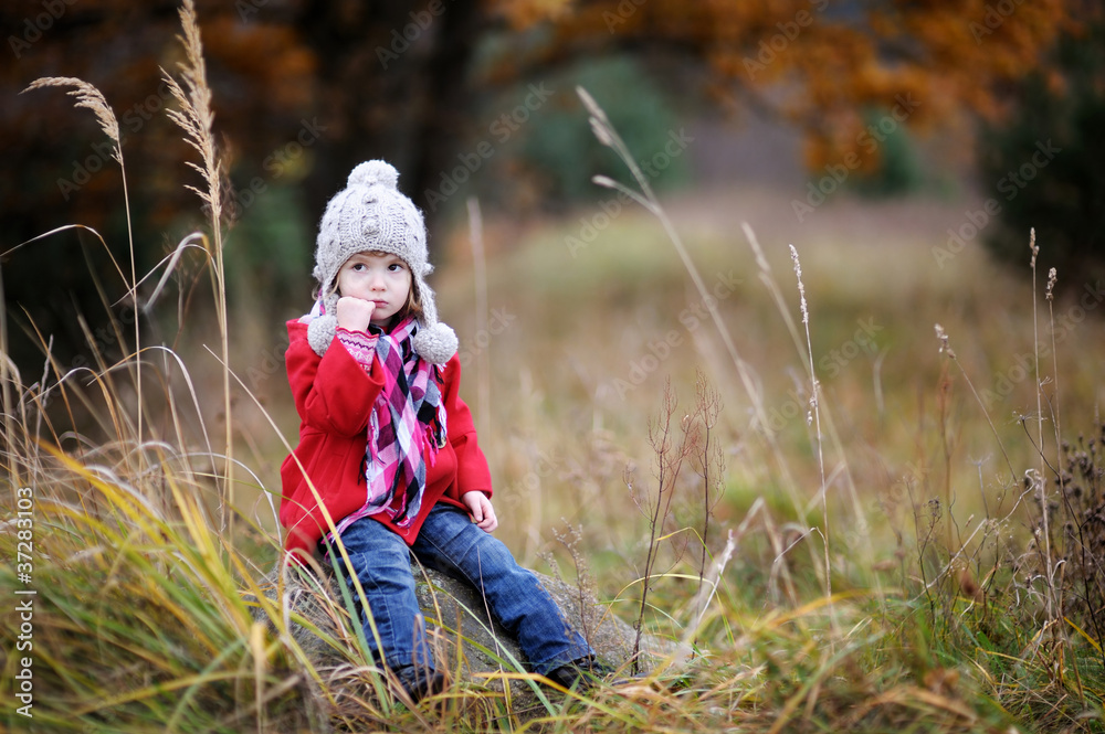 Adorable girl having fun on beautiful autumn day Adorable girl having fun on beautiful autumn day