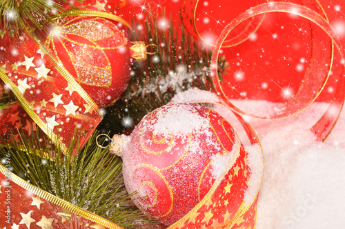 Fényképezés Two decorative red Christmas balls on a snowy scene
