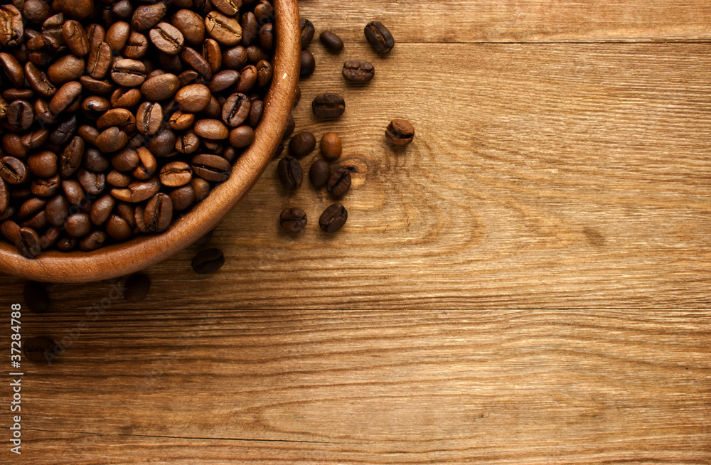 Bowl of coffee. View from above on a wooden surface. Bowl of coffee. View from above on a wooden surface.