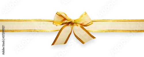 Gold ribbon with bow on white