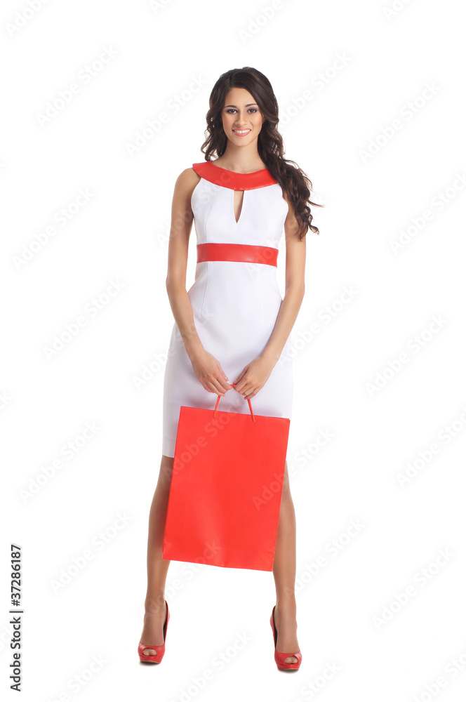 Young beautiful woman holding shopping bags Young beautiful woman holding shopping bags