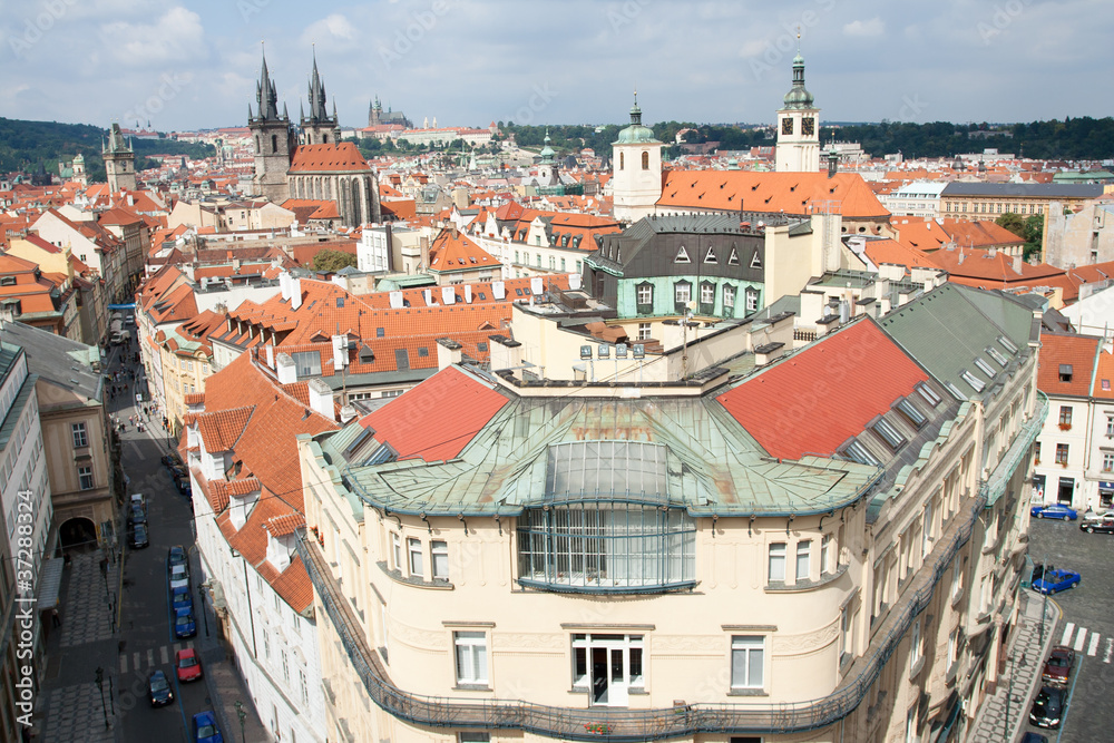Top view cityscape on old Prague district, tiled mansard roofs
