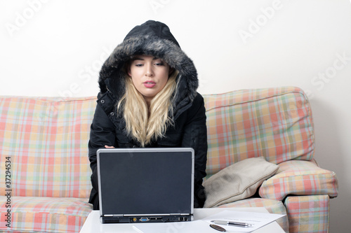 A cold woman is still working at home