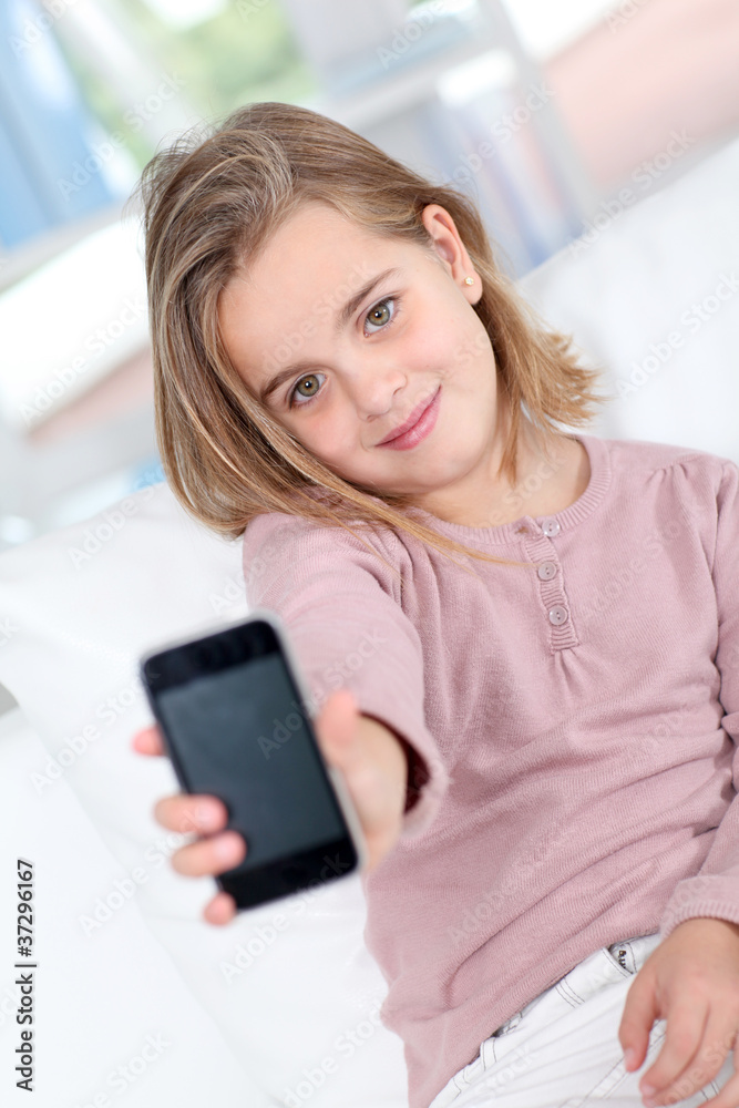 Portrait of little girl with mobile phone Portrait of little girl with mobile phone