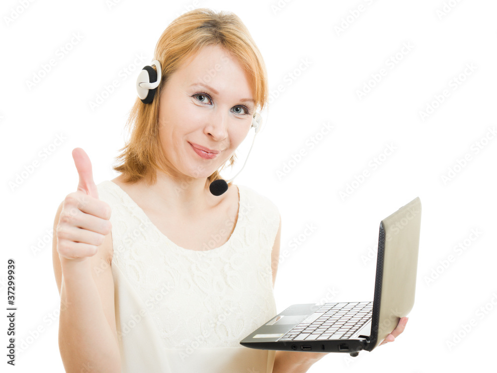 The friendly woman operator displays okay with a laptop The friendly woman operator displays okay with a laptop