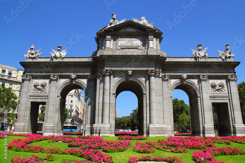 Madrid Puerta de Alcala with flower gardens
