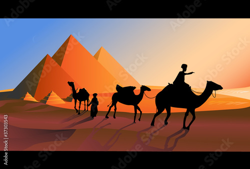 Bedouin caravan camels against over pyramids.
