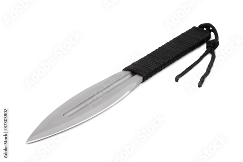 The pointed metal blade with a braided handle lies photo