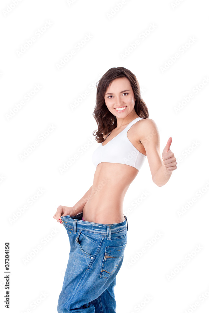 slim woman in big jeans slim woman in big jeans