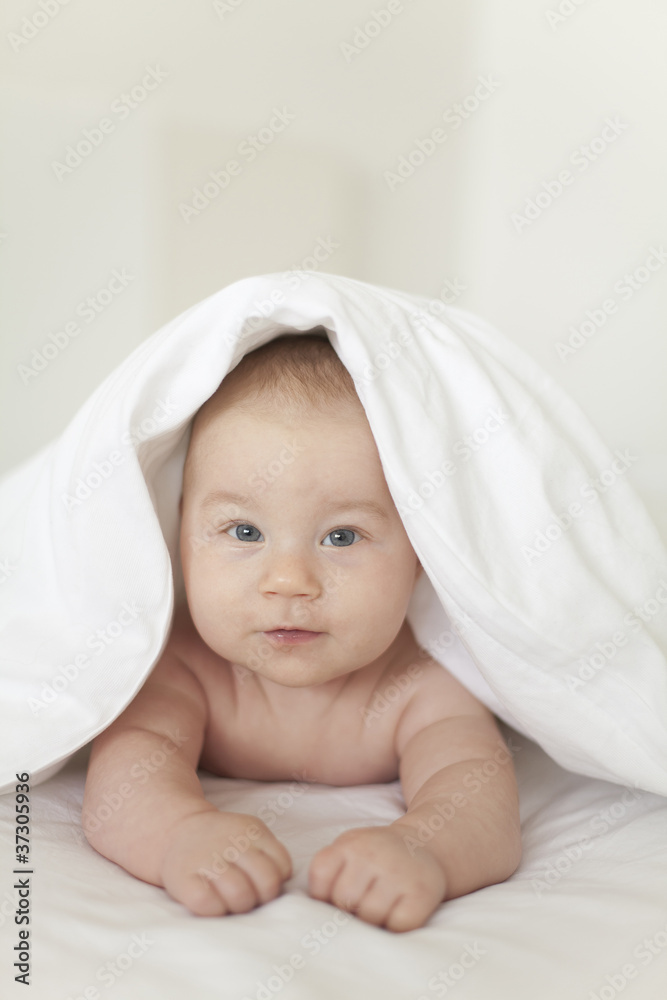adorable baby look from under the blanket adorable baby look from under the blanket