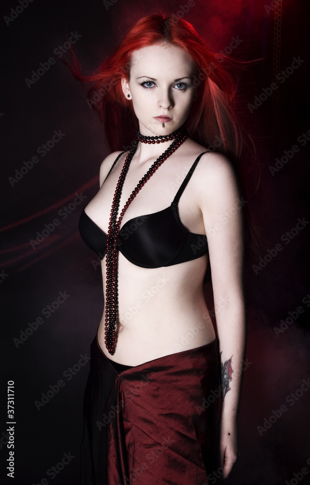 A beautiful woman with red hair A beautiful woman with red hair