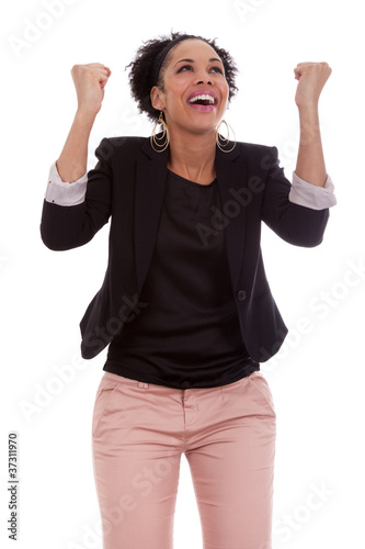 African american woman celebrating success with clenched fists