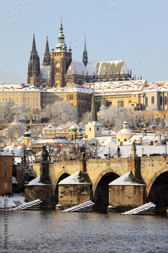 Canvas Print Romantic Snowy Prague gothic Castle with the Charles Bridge