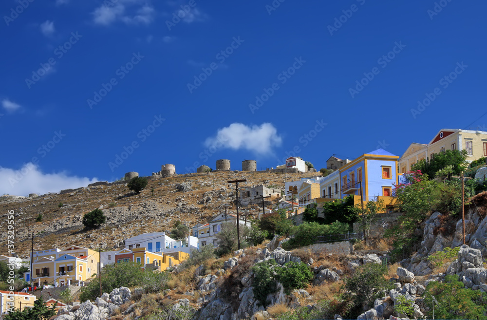 Greece. Dodecanesse.Island Symi (Simi).houses on rocks