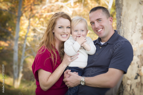 Young Attractive Parents and Child Portrait © Andy Dean