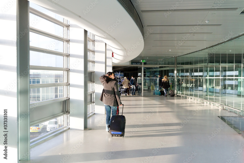 Business travel with luggage on the airport
