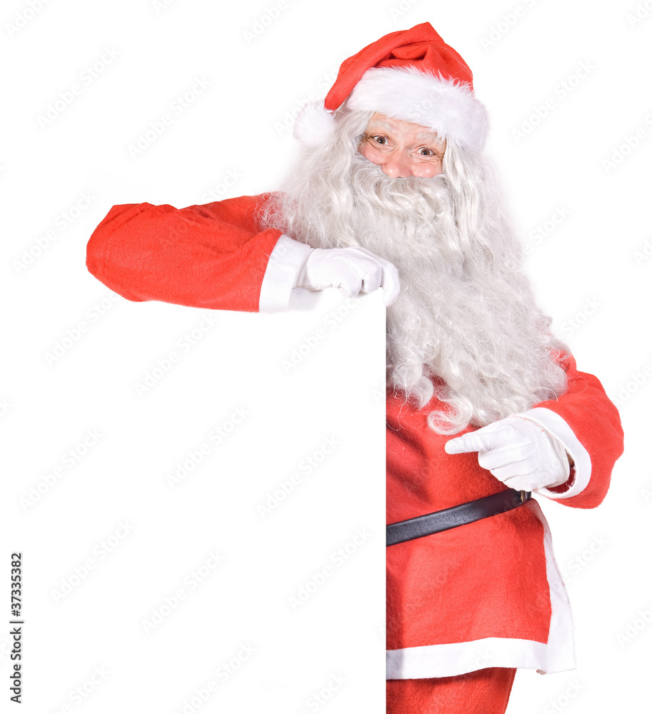 Naklejka premium Santa Claus holding a blank sign