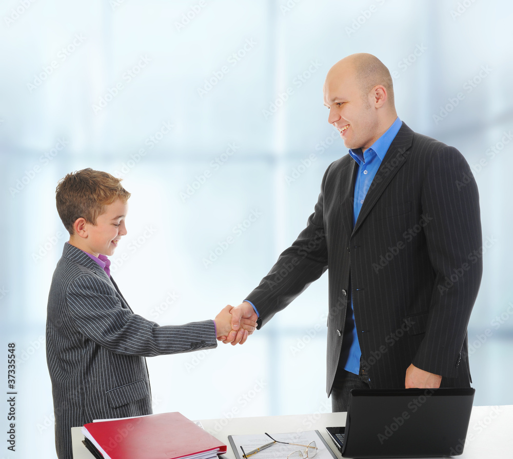 Handshake man and boy Handshake man and boy