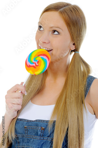 happy curly  woman with a lollipop © Valeriy Lebedev