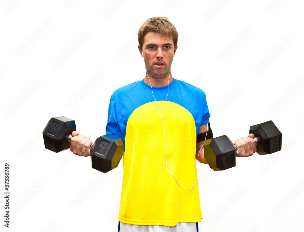 Athletic Man Lifting Weights in the Gym Athletic Man Lifting Weights in the Gym