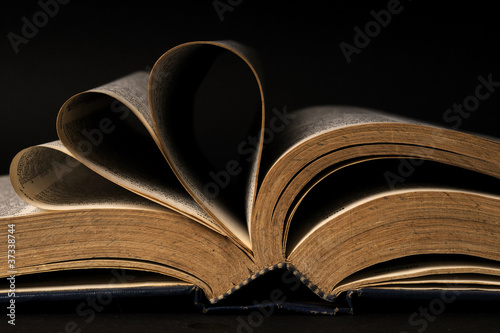 pages of book isolated on black background