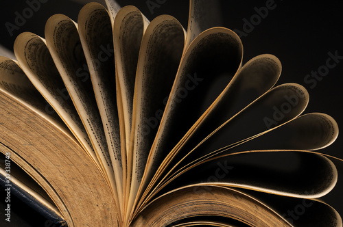 pages of books isolated on black background photo