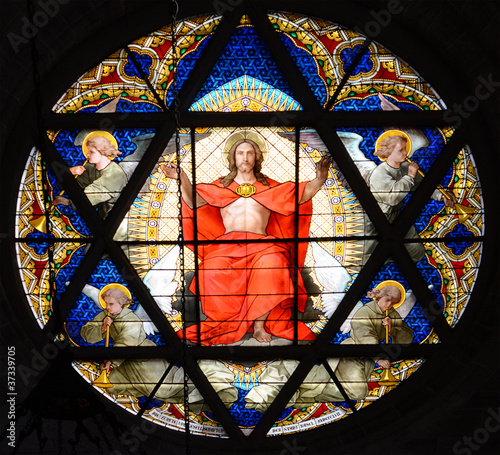 Stained glass window. Cathedral of BAsel, Switzerland photo