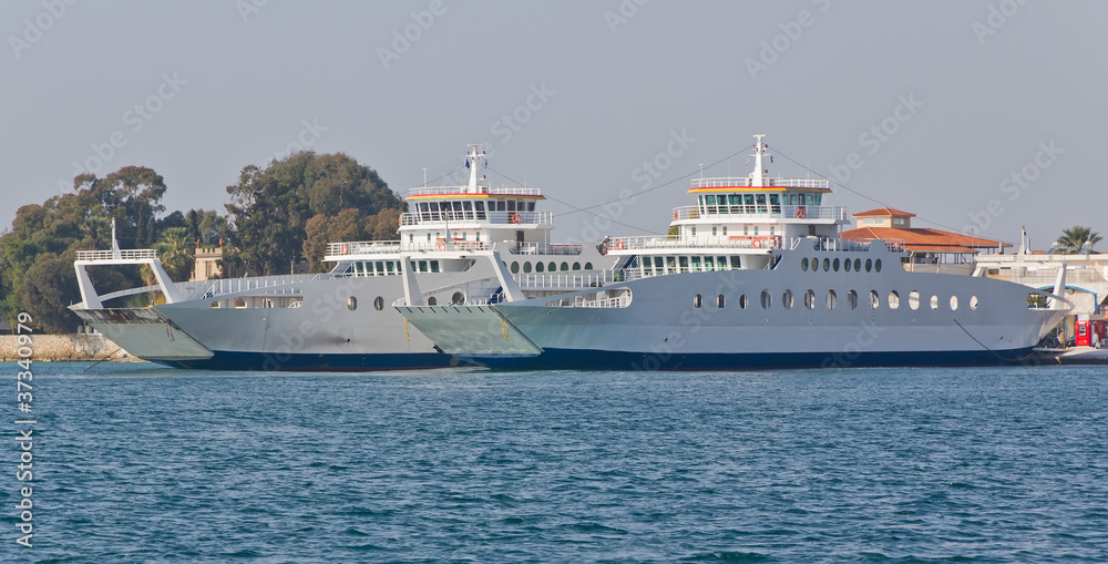 Two ferry boats at port
