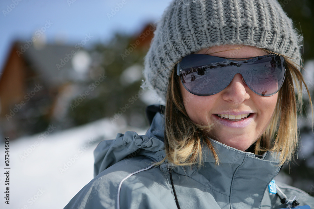 Portrait of a young woman at ski resort
