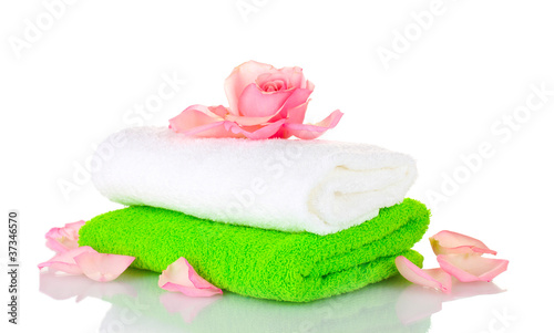 Towel and flower isolated on white