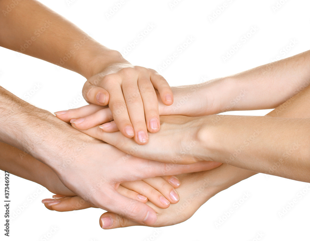 group of young people's hands isolated on white group of young people's hands isolated on white