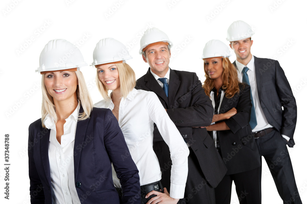 Team of construction workers isolated on white Team of construction workers isolated on white