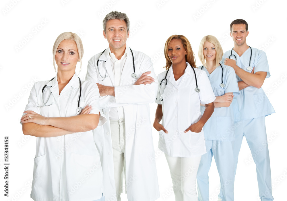 Team of doctors standing in line isolated on white Team of doctors standing in line isolated on white
