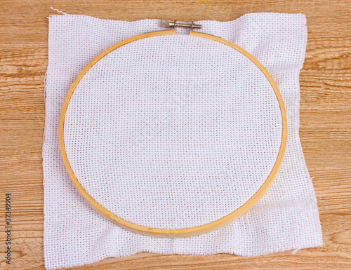 Embroidery hoop in the table