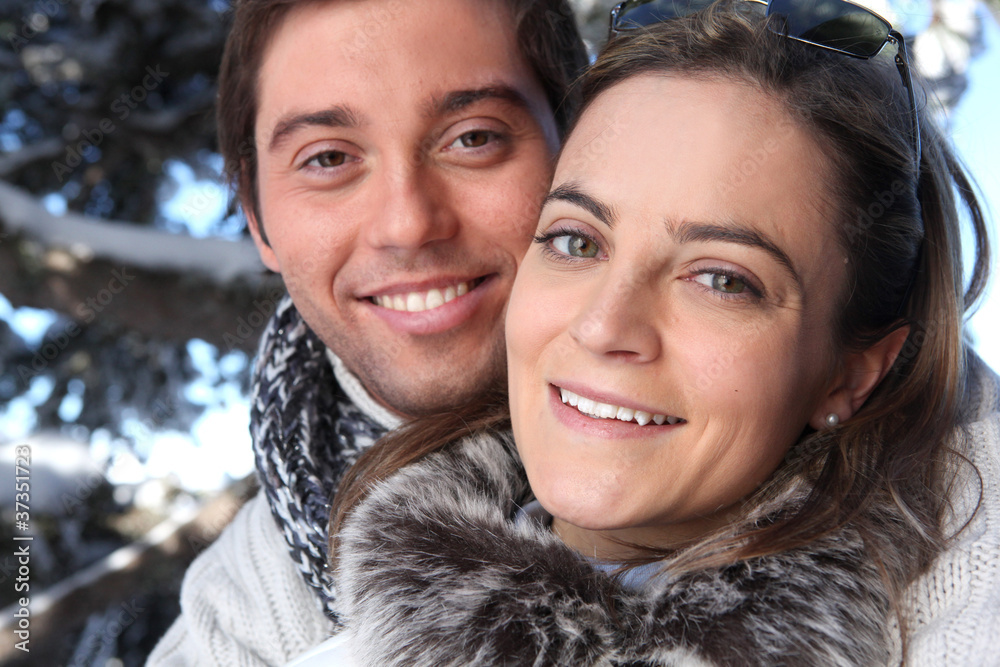 Couple taking a winter walk Couple taking a winter walk