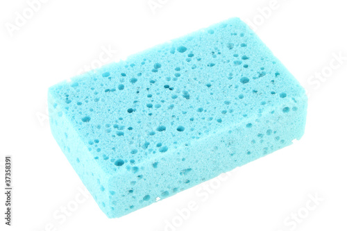 Blue piece of sponge on white background.