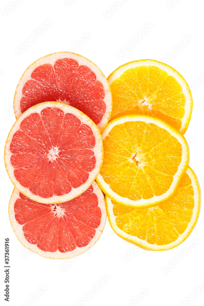 Slices of various citruses on white Slices of various citruses on white