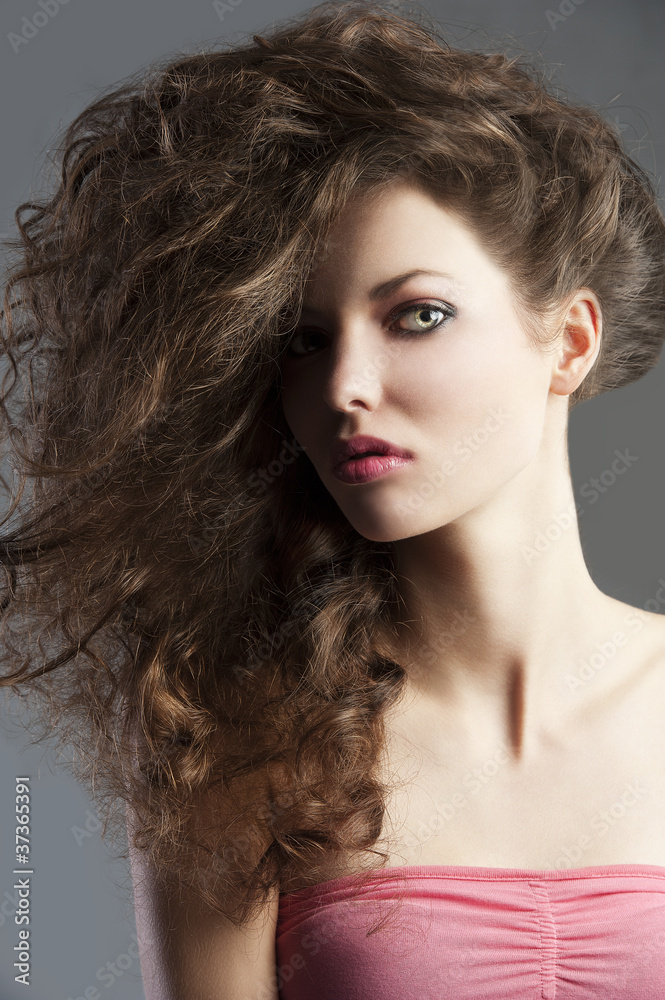 pretty girl with great hair style, she is portrayed at middle bu pretty girl with great hair style, she is portrayed at middle bu