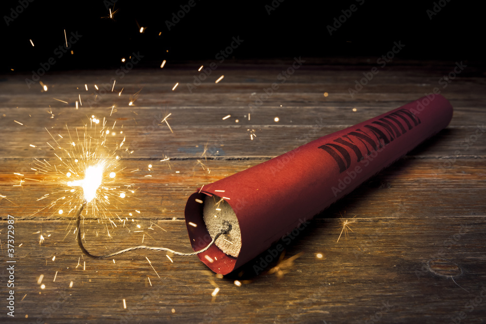 Foto Lit dynamite stick on the floor