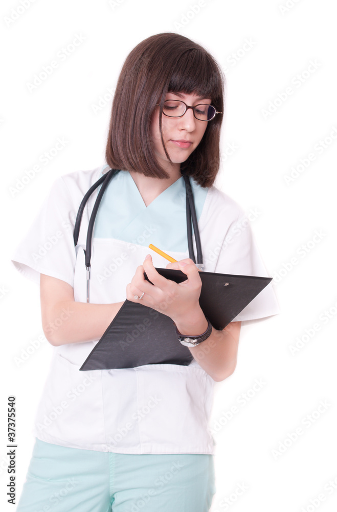 Female doctor holding clipboard and smiling Female doctor holding clipboard and smiling