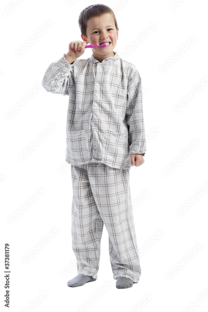 little boy in pajama cleaning his teeth little boy in pajama cleaning his teeth