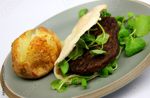 Vegetarian burger, watercress, Pitta brea,  Baked Potato photo