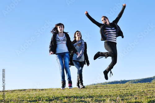 group of teens have fun outdoor