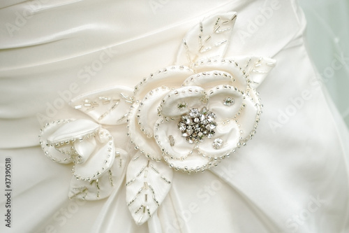 Brides dress flower detail.