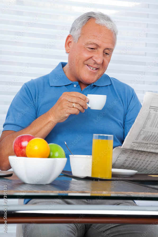 Senior Man Reading Newspaper